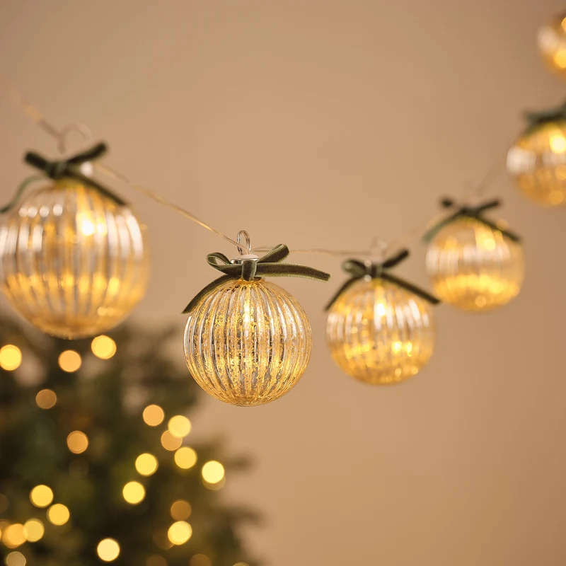 10er LED-Lichterkette mit Glaskugeln und grünen Schleifen in Antik-Look